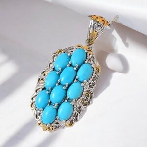 Sleeping Beauty Turquoise Pendant Vermeil YG and Platinum STG  Silver 4.20 Ct